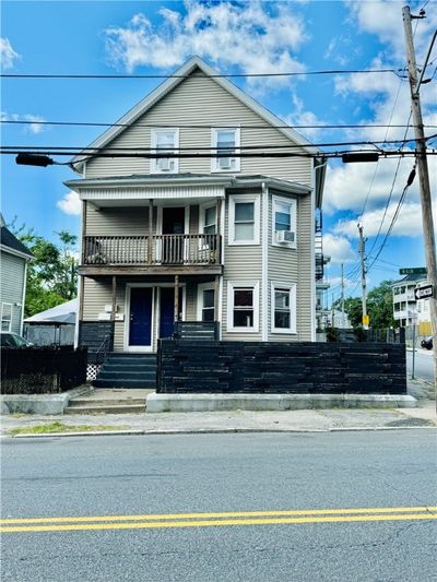 1071 Main Street, Home with 6 bedrooms, 3 bathrooms and 6 parking in Pawtucket RI | Image 1