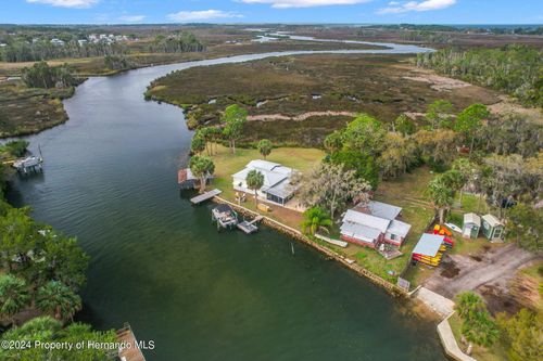 8064 Marys Fish Camp Rd, WEEKI WACHEE, FL, 34607-1234 | Card Image
