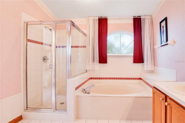 Primary En Suite Bathroom with Walk In Shower and Garden Tub | Image 32