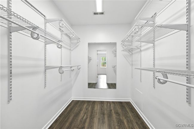 Spacious Walk-in closet with Laminate floors | Image 19