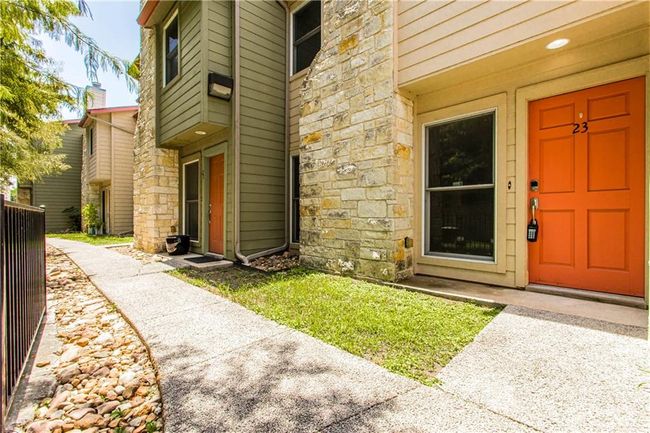 Entrance to property featuring stone siding | Image 17