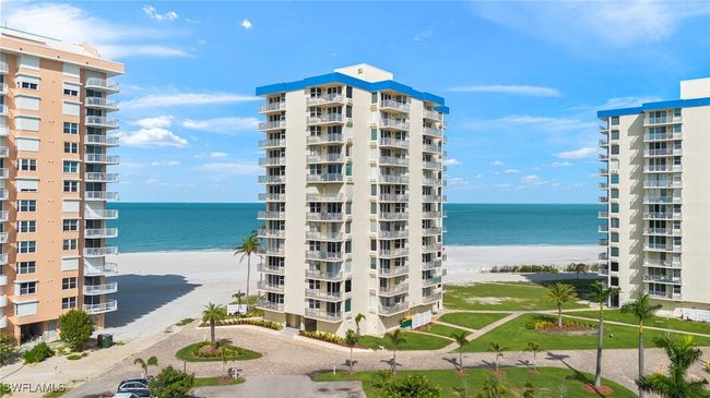 View of apartment building / complex featuring a water view | Image 28