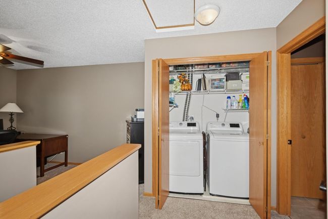 Handy Laundry area with shelving | Image 23