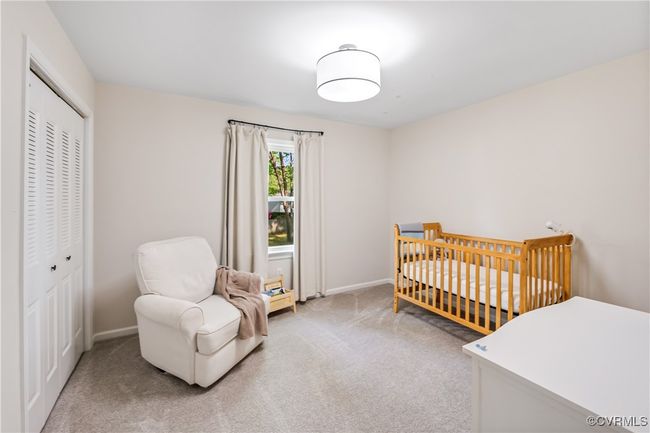 Bedroom with a closet, carpet, and baseboards | Image 14