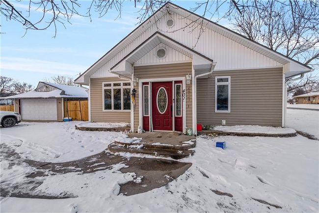 View of front facade with a garage | Image 4
