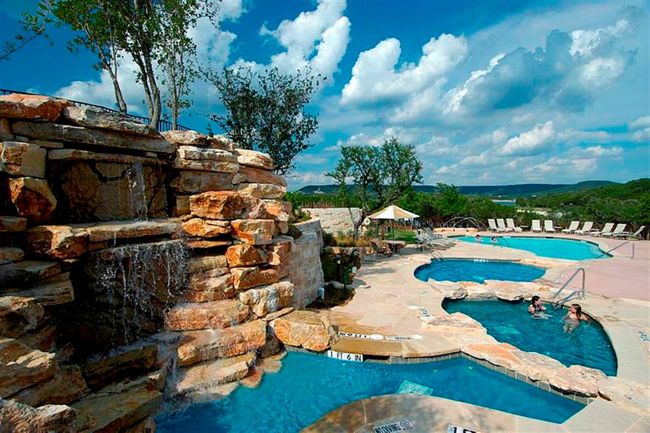 Community pool with a patio area | Image 28