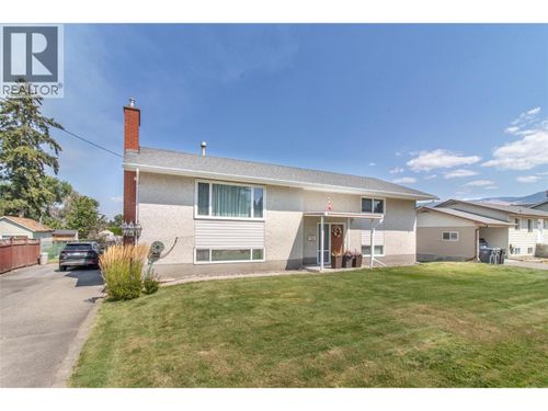 210 Wallace Road, House with 4 bedrooms, 2 bathrooms and null parking in Kelowna BC | Card Image