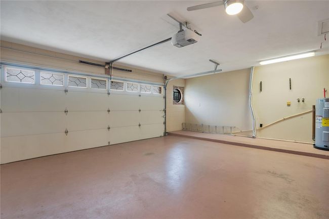 Over-sized garage with insulated garage door. | Image 29