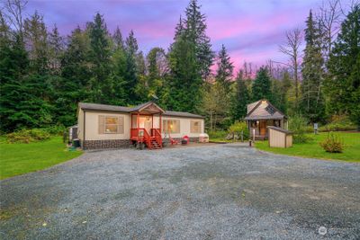 Welcome to 17266 Barrell Springs Lane. This home is located on 5 private acres with easy access to Blanchard Mountain trails, making it an adventurer's perfect home. | Image 1