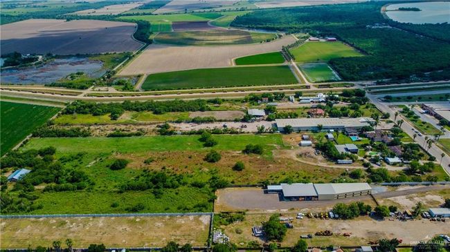 View of rural area featuring rows of crops | Image 11
