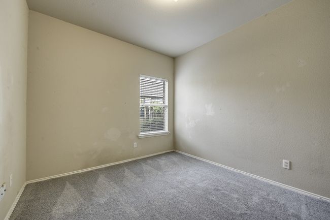 Carpeted spare room featuring baseboards | Image 6