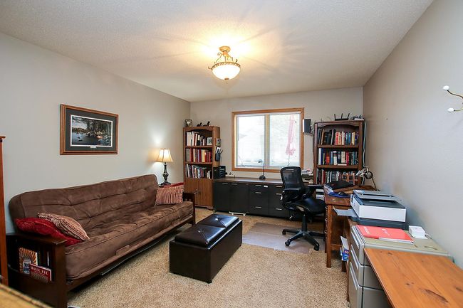 The second bedroom is currently being used as an office. | Image 9