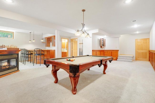 Pool table in game room | Image 27