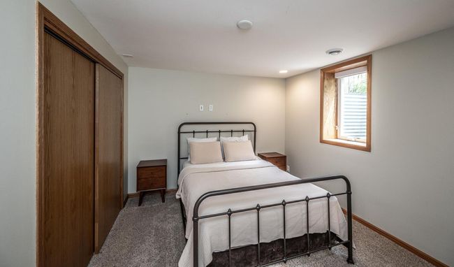 Lower level bedroom (third of four bedrooms) | Image 24