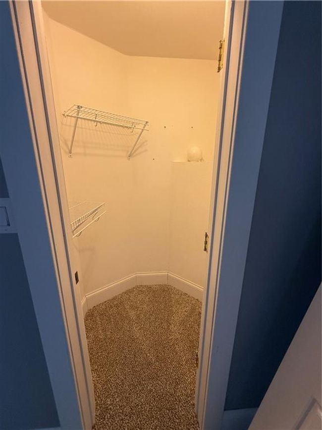View of walk in closet | Image 21