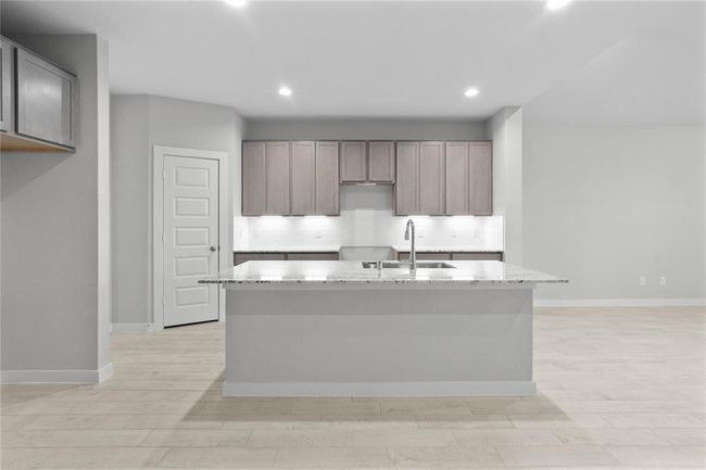 This photo is for illustrative purposes only and is not to be considered an exact replica of the finished home. Rendering does not match the finished product in terms of features, colors, landscaping, etc. Pricing, specifications, square footage and materials are subject to change at any time and without notice. | Image 5