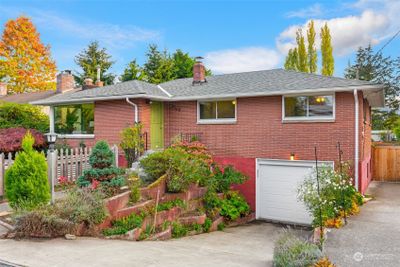 This Shoreline Mid-Century offers something for everyone with a great layout, plentiful outdoor space, wonderful shop areas and the option to finish out an ADU to gain even more living or working space. | Image 1