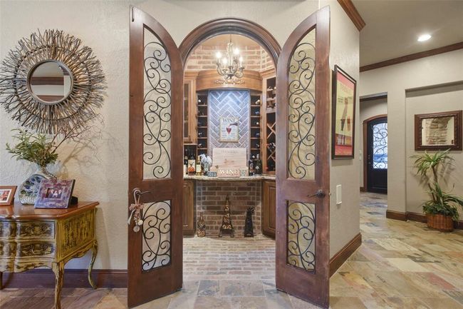The wine room just off the chef’s kitchen has ample space for your wine selections and refrigeration | Image 14