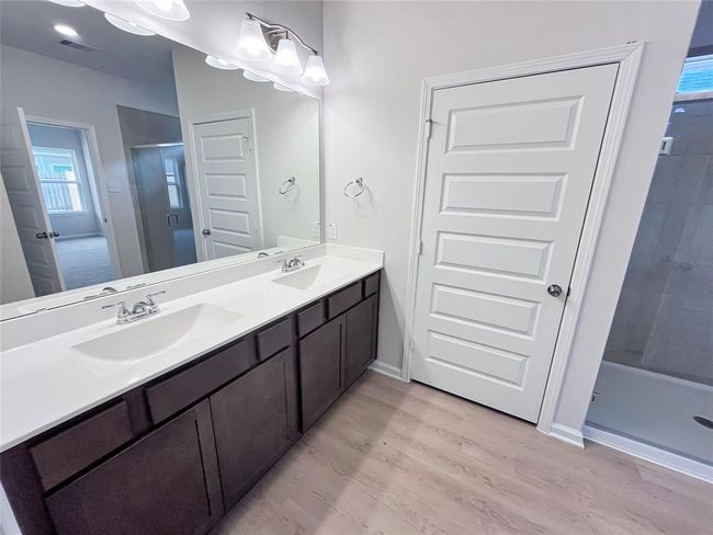The Cardinal II- Primary Bathroom with Large Walk-in Shower. Home under construction. Sample floor plan photo used for illustrative purposes only. Upgrades, selections options, windows and colors may vary. | Image 9