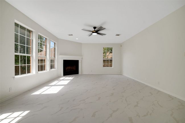 Large open living room with a fireplace | Image 14