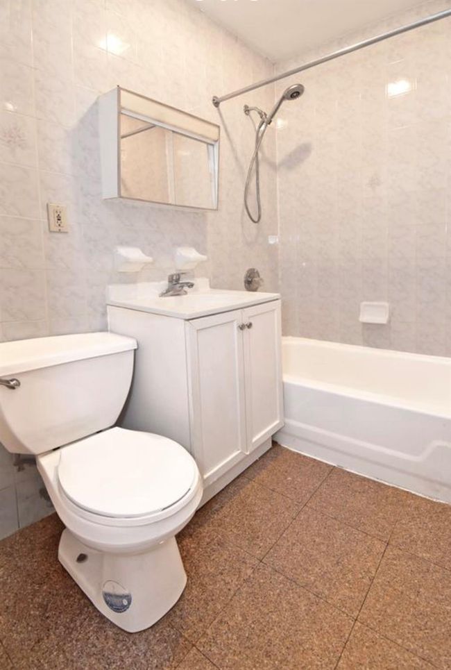 Full bath with vanity and bathing tub / shower combination | Image 8