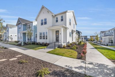 View of front of property featuring a front yard | Image 1