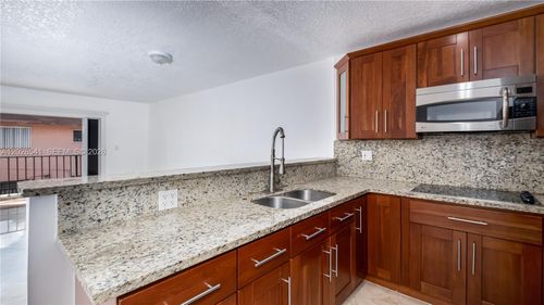 18b-4390 W 12th Ln, Hialeah, FL, 33012-5980 | Card Image
