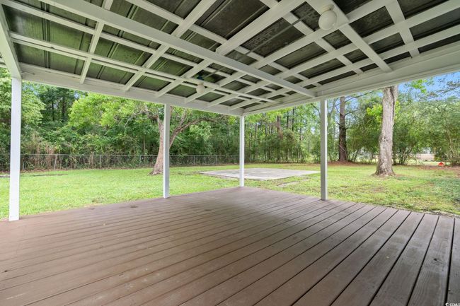 Deck featuring a patio | Image 16
