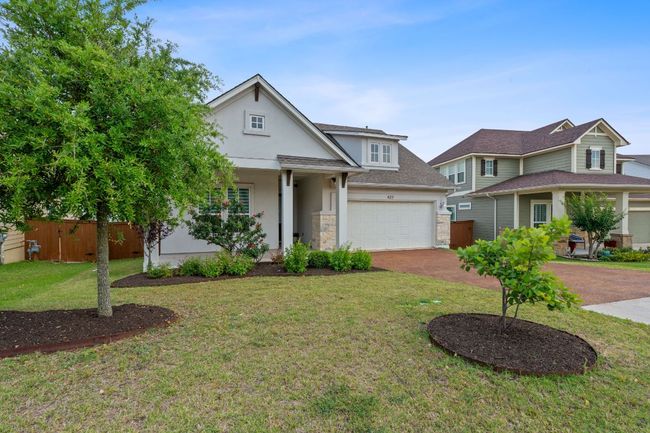 The flower beds bloom almost all year long with different species planted so each flowers at a different time - all Texas weather tolerant. | Image 9
