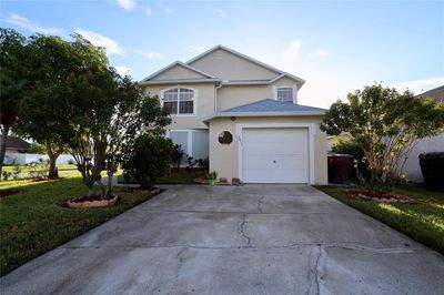 Driveway showing the custom shutters | Image 2