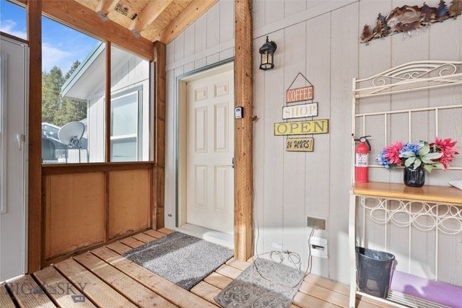 Main Home Screened in Porch - Entrance to Mudroom | Image 32