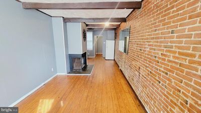 703 Tessier Street, Townhouse with 3 bedrooms, 1 bathrooms and null parking in BALTIMORE MD | Image 2