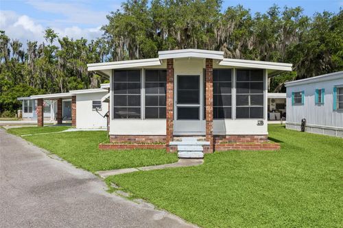 b-13 Cocos Plumosa Dr, EUSTIS, FL, 32726-7409 | Card Image