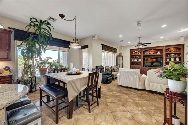 Dining space with plenty of natural light, recessed lighting, and ceiling fan | Image 22