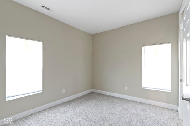 carpeted spare room featuring baseboards | Image 27