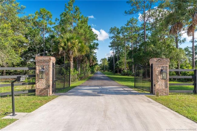 5906 Ludlum St, House other with 5 bedrooms, 5 bathrooms and 3 parking in Palm City FL | Image 11