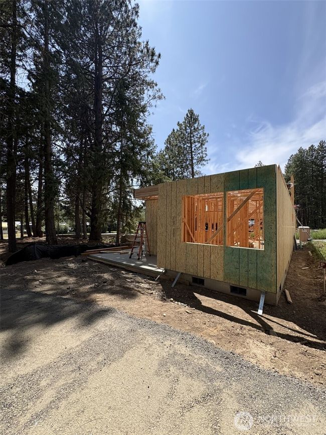 As the newest PNW master-planned community, enjoy 200+ acres of open space, trails & the Coal Trax Mt Bike Park. Soaring ceilings in the great roommake each day worthy of celebration & open floorplan appeals to entertaining. Covered deck & patio. Southern-facing homesites range from the mid600s- 900ks. Enjoy a variety of innovative & distinctive new home options with the best all-season recreation just moments away! Built for the future, indulge in a retreat just 90-min to Seattle. Plans and elevations are artist’s renderings only, may not accurately represent the actual condition of a home asconstructed and may also contain options and upgrades which are not included in the sale. Trailside Homes reserves the right to make changes to the floorplan, specifications, dimensions, design and elevations without prior notice. Stated dimensions and square footage are estimated and should not be usedas representations of the home’s actual size. | Image 7