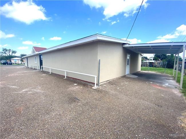 View of property exterior featuring a carport | Image 7