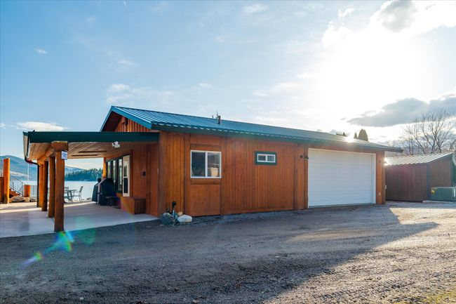 Cottage with attached 2 car garage. | Image 83