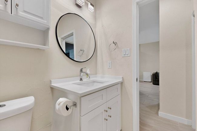 Bathroom featuring vanity and wood finished floors | Image 26