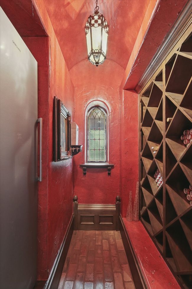 The wine cellar with drink refrigerator makes storage and entertaining easy | Image 9