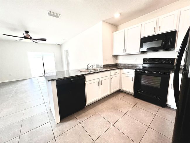 32657 Pez Landing Lane, House other with 3 bedrooms, 2 bathrooms and null parking in Wesley Chapel FL | Image 29