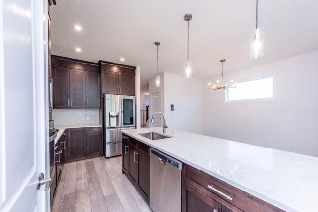 1149 Chinook Gate Bay Sw, Home with 4 bedrooms, 3 bathrooms and 2 parking in Airdrie AB | Image 10