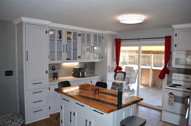 612 1 St St, House other with 3 bedrooms, 1 bathrooms and null parking in Olathe CO | Image 4