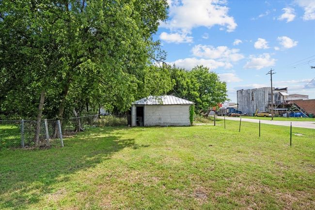 View of yard featuring an outbuilding | Image 17