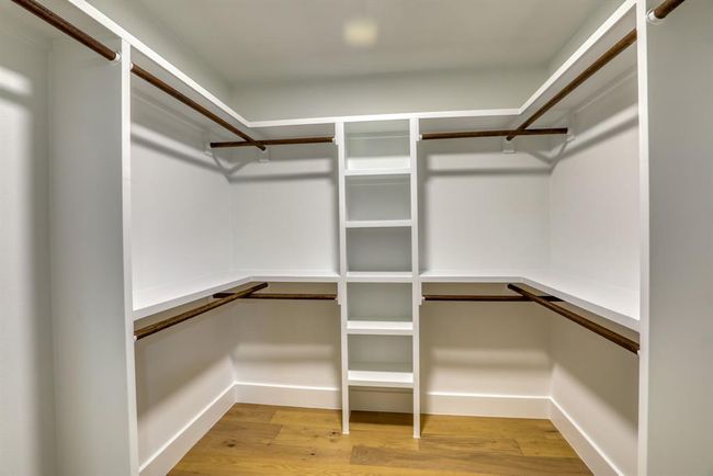 Primary walk in closet with built ins | Image 24