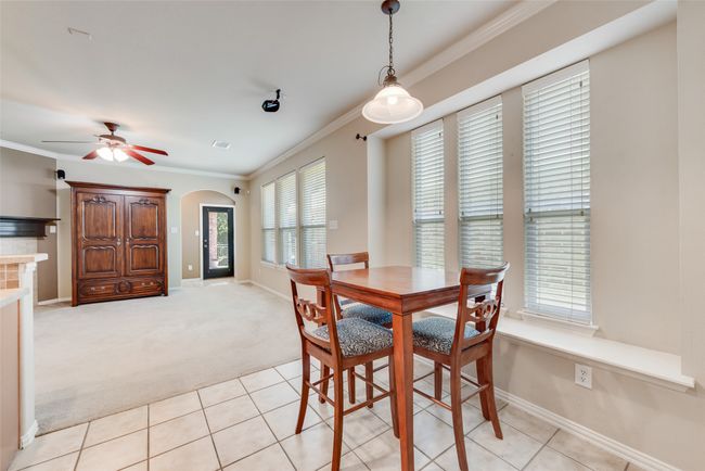 The kitchen nook hosts a walk-in pantry and a window seat. | Image 9