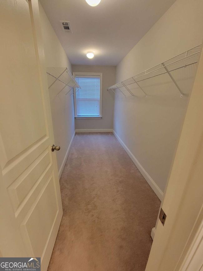 8265 Village Pl, Townhouse with 3 bedrooms, 3 bathrooms and 2 parking in Suwanee GA | Image 23