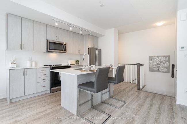 61 Kenneth Kirby Lane, House attached with 2 bedrooms, 3 bathrooms and 3 parking in Stouffville ON | Image 13
