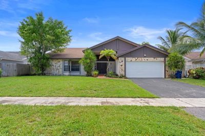 6900 Nw 47th Place, House other with 3 bedrooms, 2 bathrooms and null parking in Lauderhill FL | Image 2